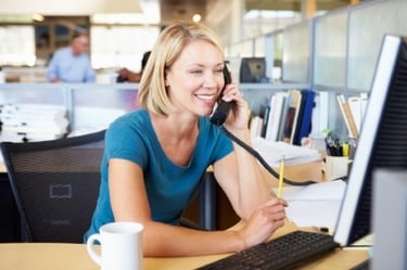 Blonde Woman Calling Business on Telephone Blonde Woman Calling Business on Telephone